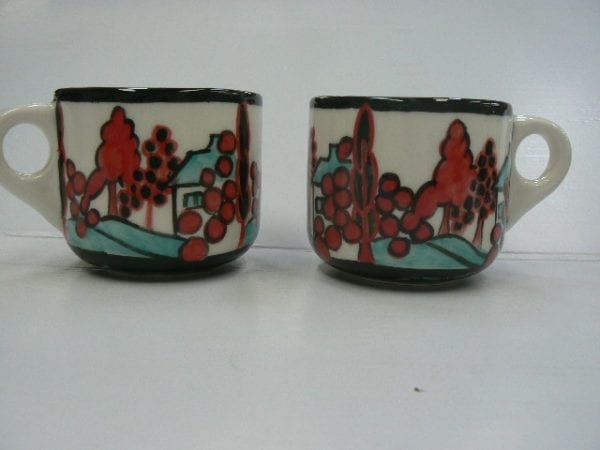 Mugs with landscape in reds and blues